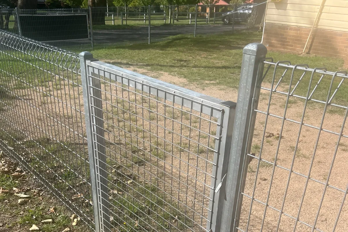 Galvanized roll-top welded mesh fence and pedestrian gate